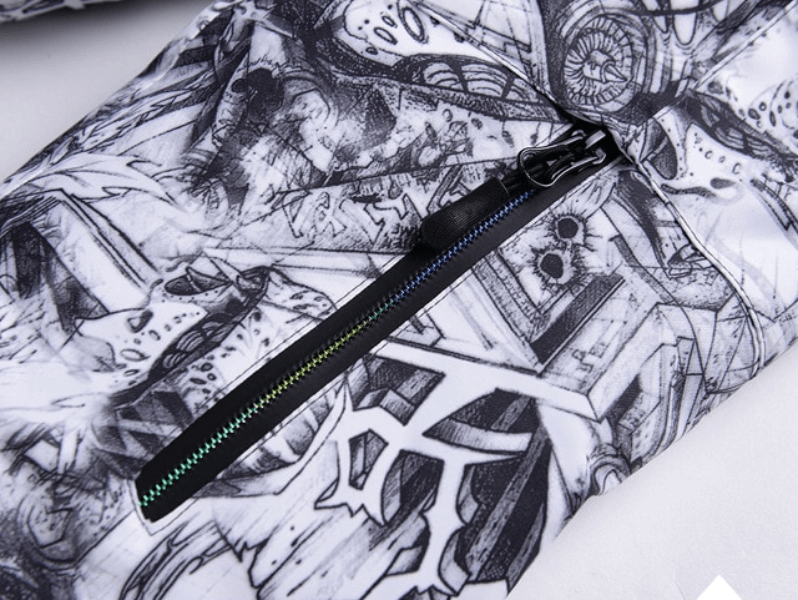 Close-up of patterned zipper on waterproof windproof men's ski jacket, perfect for skiing in winter conditions.